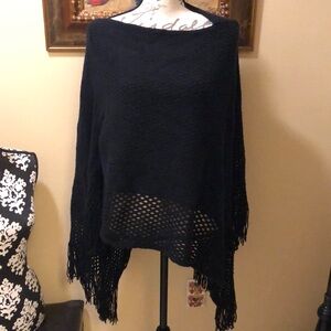 Comfy cozy over the head knit and crochet fringed asymmetrical poncho